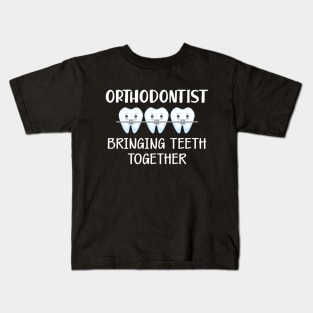 Orthodontist bringing teeth together Kids T-Shirt